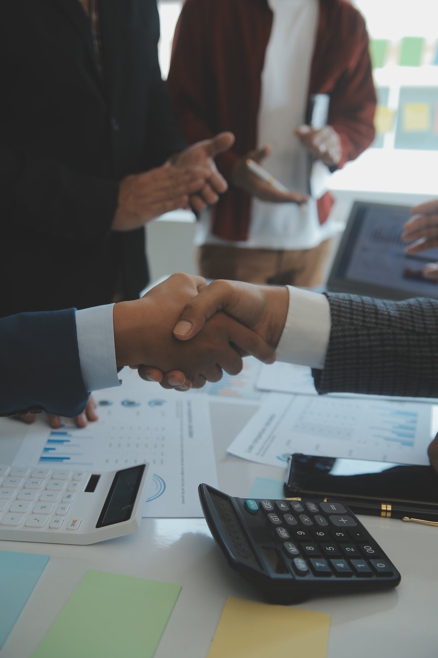 success-teamwork-concept-business-people-joining-hands-city-background